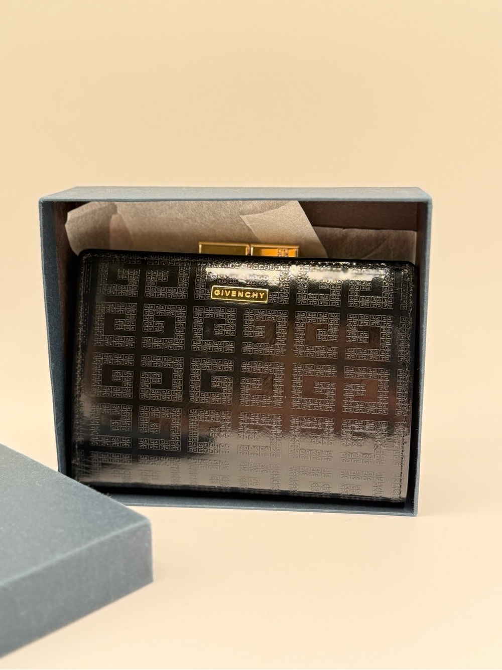 Vintage Givenchy 4G Monogram Black Leather Logo-Pattern Compact Wallet Pre-Owned